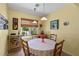 Cozy dining area with views of the outdoor greenery at 7817 Homing Pigeon St, North Las Vegas, NV 89084
