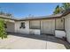 Charming courtyard entrance with stucco walls, decorative accents, and double door entry at 7898 Wishing Well Rd, Las Vegas, NV 89123