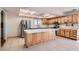 Spacious kitchen featuring an island, stainless steel appliances, and ample cabinet space at 7898 Wishing Well Rd, Las Vegas, NV 89123