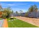 Well-maintained backyard featuring an artificial lawn and a relaxing lounge chair at 8509 Lansdale Rd, Las Vegas, NV 89123