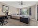 Bedroom with a large window and comfortable furnishings at 8509 Lansdale Rd, Las Vegas, NV 89123