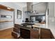 Stylish kitchen featuring a stainless steel oven, hood, and contemporary design elements at 8509 Lansdale Rd, Las Vegas, NV 89123