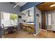 Eat-in kitchen featuring an island, modern appliances, and lots of natural light at 8509 Lansdale Rd, Las Vegas, NV 89123