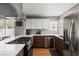 Well-equipped kitchen with stainless steel appliances, modern cabinetry, and quartz countertops at 8509 Lansdale Rd, Las Vegas, NV 89123