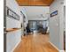 Inviting living space featuring modern decor, wood floors, and a cozy fireplace at 8509 Lansdale Rd, Las Vegas, NV 89123