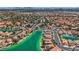 Stunning aerial view overlooking houses on a beautiful lake at 8713 Nautical Bay Ln, Las Vegas, NV 89117