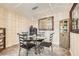 Cozy dining room featuring a glass table and decorative chandelier at 8713 Nautical Bay Ln, Las Vegas, NV 89117