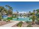 Scenic lake view highlighting waterfront homes, lush greenery, and boat docks at 8713 Nautical Bay Ln, Las Vegas, NV 89117