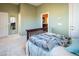 Bedroom with green walls and hardwood floors at 9077 Creed Mountain Pl, Las Vegas, NV 89178