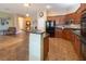 Spacious open kitchen with dark granite counters and stainless appliances at 9077 Creed Mountain Pl, Las Vegas, NV 89178