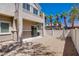 Cozy backyard featuring low maintenance gravel, a covered patio, and privacy fencing at 10062 Aspen Rose St # 103, Las Vegas, NV 89183