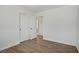 Clean bedroom with vinyl flooring, closet, and neutral palette at 10062 Aspen Rose St # 103, Las Vegas, NV 89183