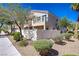 Charming home exterior with a private fenced yard and desert-friendly landscaping at 10062 Aspen Rose St # 103, Las Vegas, NV 89183