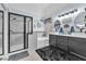 Bathroom with walk-in shower, free-standing tub and dual vanities at 10654 Sidlaw Hills Ct, Las Vegas, NV 89141