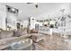 Open-concept design featuring a spacious living room, kitchen with island, and seamless flow for entertaining at 10654 Sidlaw Hills Ct, Las Vegas, NV 89141