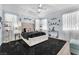 Comfortable main bedroom with vaulted ceiling, soft lighting, and neutral colors at 10654 Sidlaw Hills Ct, Las Vegas, NV 89141