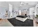 Light-filled main bedroom with vaulted ceiling, wood floors, and calming decor at 10654 Sidlaw Hills Ct, Las Vegas, NV 89141