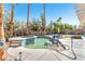 Inviting pool and spa area with stone accents and landscaping, ideal for outdoor living at 10654 Sidlaw Hills Ct, Las Vegas, NV 89141