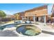 Sparkling pool and spa, perfect for relaxation and recreation in a private backyard oasis at 10654 Sidlaw Hills Ct, Las Vegas, NV 89141