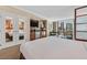 Stylish bedroom featuring an entertainment area and a city view at 135 E Harmon Ave # 2303, Las Vegas, NV 89109