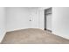 Bedroom featuring neutral carpet and a closet. Transform this blank canvas to your cozy space at 1411 Norman Ave, Las Vegas, NV 89104