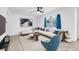 Bright living room with white walls, modern furniture, and natural light at 1411 Norman Ave, Las Vegas, NV 89104