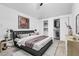 This main bedroom features a plush bed, closet with clothing, and soothing decor for a relaxing retreat at 1411 Norman Ave, Las Vegas, NV 89104