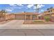 Cozy single story home featuring desert landscaping and a two car garage at 1468 Harmony Hill Dr, Henderson, NV 89014