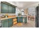 Kitchen with lots of cabinet space, tile countertops, and stainless steel sink at 1468 Harmony Hill Dr, Henderson, NV 89014