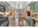 Bright kitchen features a center island and sliding doors to backyard at 1468 Harmony Hill Dr, Henderson, NV 89014