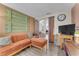 Spacious living room with access to dining area with modern decor at 1468 Harmony Hill Dr, Henderson, NV 89014