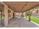 Outdoor patio featuring ample seating and access to the backyard at 1468 Harmony Hill Dr, Henderson, NV 89014