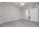 Bedroom with wood-look flooring and two closet doors at 1609 Hills Of Red Dr # 104, Las Vegas, NV 89128