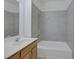 Bathroom showcasing tile surround and modern fixtures at 1830 N Buffalo Dr # 2024, Las Vegas, NV 89128