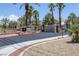 Gated community entrance with lush landscaping at 1830 N Buffalo Dr # 2024, Las Vegas, NV 89128