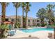 Community pool with ample lounging space at 1830 N Buffalo Dr # 2024, Las Vegas, NV 89128