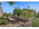 View of the backyard from the ground, showcasing a patio and well-maintained landscaping at 2026 Wildwood Lake St, Henderson, NV 89052