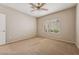 Neutral bedroom with carpet and ceiling fan at 2026 Wildwood Lake St, Henderson, NV 89052