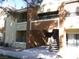 Multi-story apartment building featuring private balconies and exterior staircases, showcasing residential living at 2120 Ramrod Ave # 417, Henderson, NV 89014