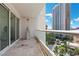 Condo balcony with tile flooring, clear railing, and skyline views at 2777 Paradise Rd # 1002, Las Vegas, NV 89109