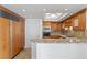 Open kitchen featuring granite countertops, custom cabinets, and stainless steel appliances, perfect for entertaining at 2777 Paradise Rd # 1002, Las Vegas, NV 89109