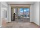 A condo balcony offers city views through a glass sliding door and features tile flooring and a decorative sculpture at 2777 Paradise Rd # 1002, Las Vegas, NV 89109