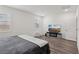 Bedroom with a bed and entertainment center at 3024 River Brook Ct, Las Vegas, NV 89139