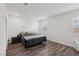 Spacious bedroom features hardwood floors and natural light at 3024 River Brook Ct, Las Vegas, NV 89139