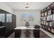 Stylish home office features a large desk, and modern decor at 3024 River Brook Ct, Las Vegas, NV 89139