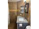 Bathroom features a gray granite countertop, modern fixtures, and decorative tiled walls at 3320 S Fort Apache Rd # 139, Las Vegas, NV 89117