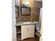 Updated bathroom with granite countertop, stylish vanity, and tiled walls create a modern and elegant space at 3320 S Fort Apache Rd # 139, Las Vegas, NV 89117