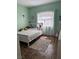 Bedroom with a white framed bed, hardwood floors, and natural light at 3320 S Fort Apache Rd # 139, Las Vegas, NV 89117