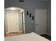 Bedroom featuring white doors and a mirrored closet at 3320 S Fort Apache Rd # 139, Las Vegas, NV 89117