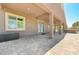 Large covered patio with stone pavers, ideal for outdoor living and entertaining at 334 Cougar Estates Ln, Las Vegas, NV 89123